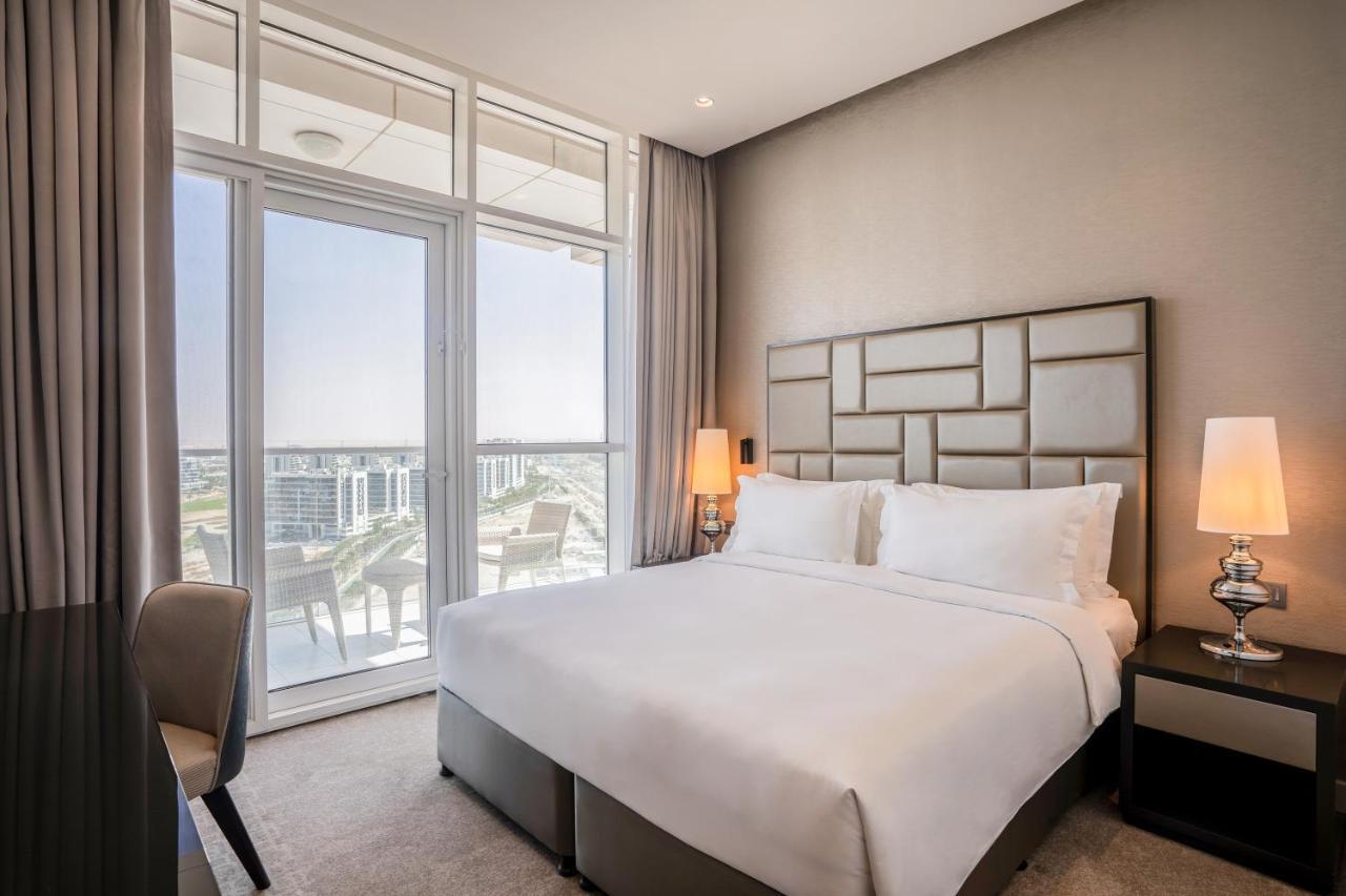 ホテル Radisson Dubai Damac Hills エクステリア 写真
